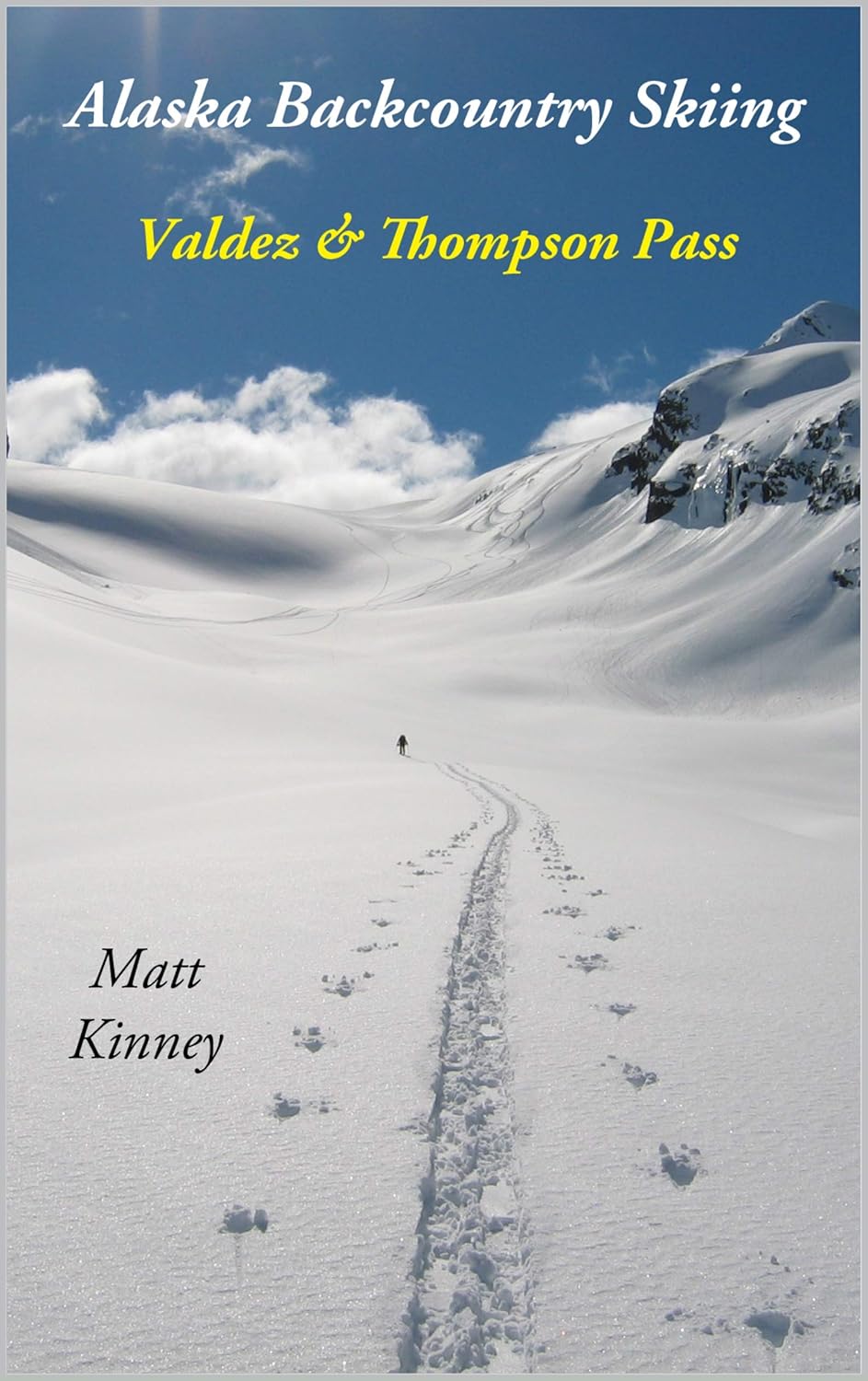 Traveler using Kindle guide on a mountain trail